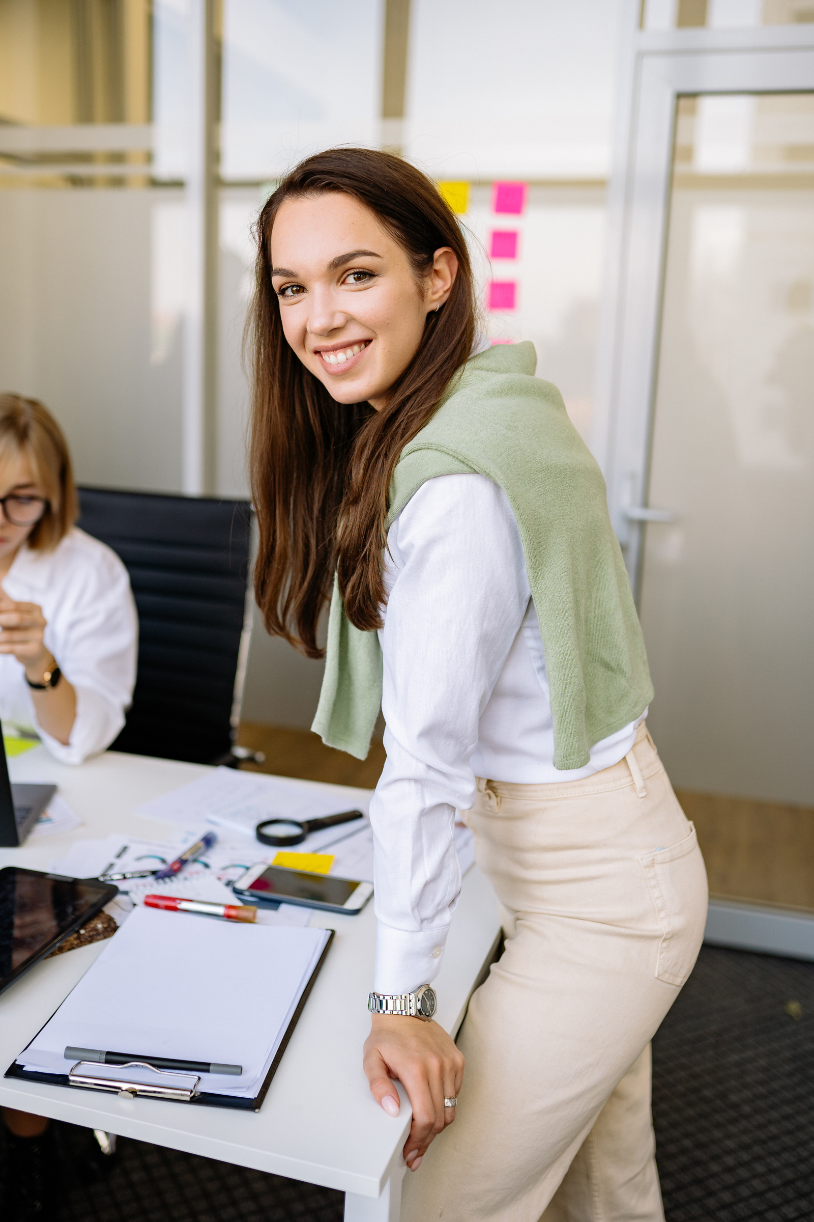 A Woman in a Workplace Looking at the Camera