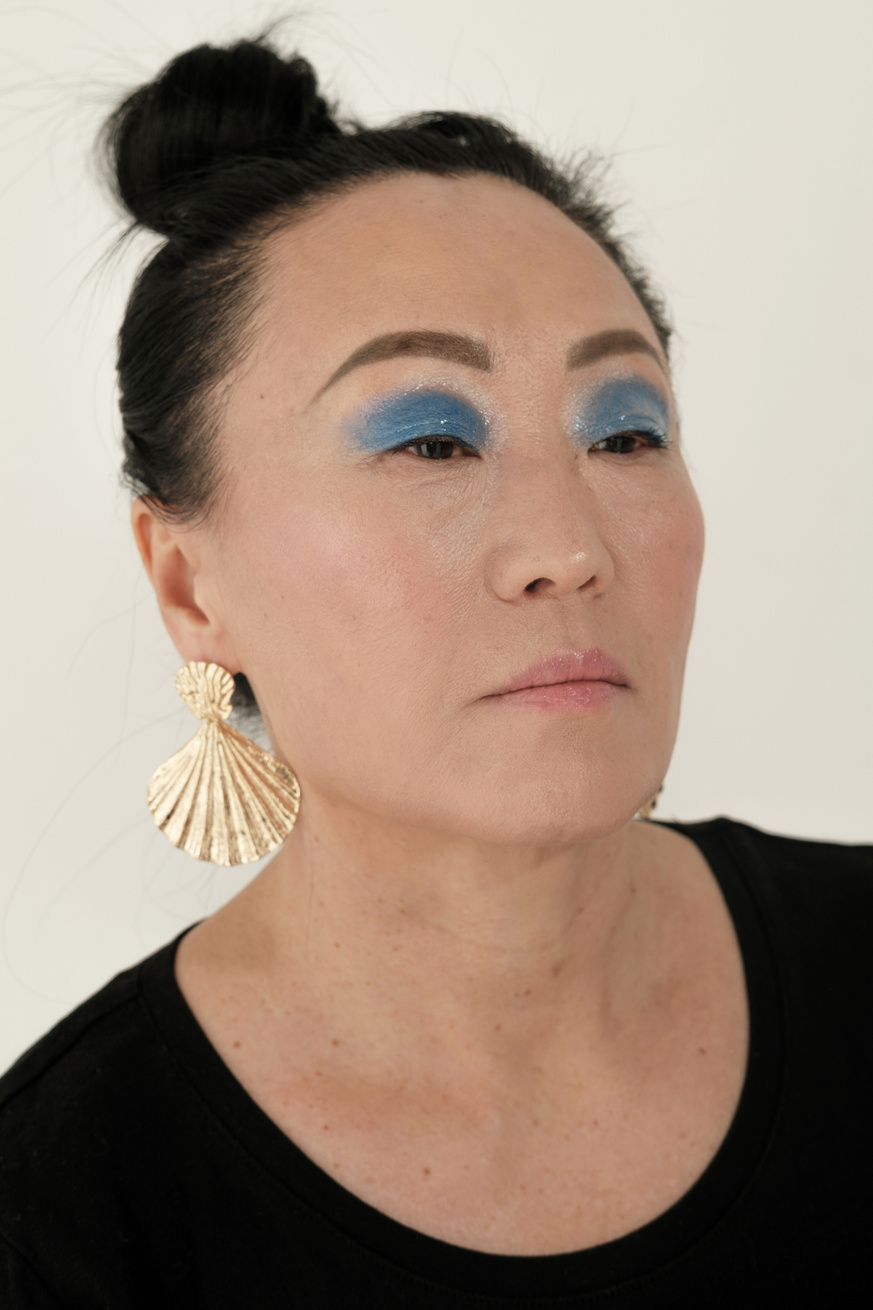 Mature Woman with Bright Blue Eyeshadow Makeup