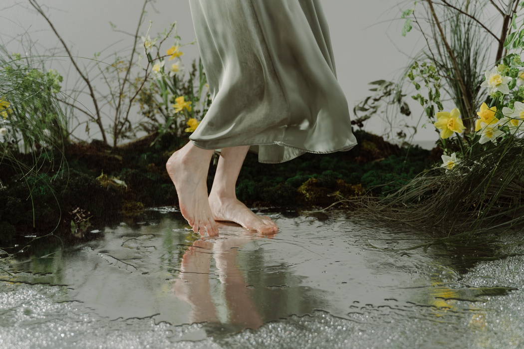 A Person Standing on a Puddle