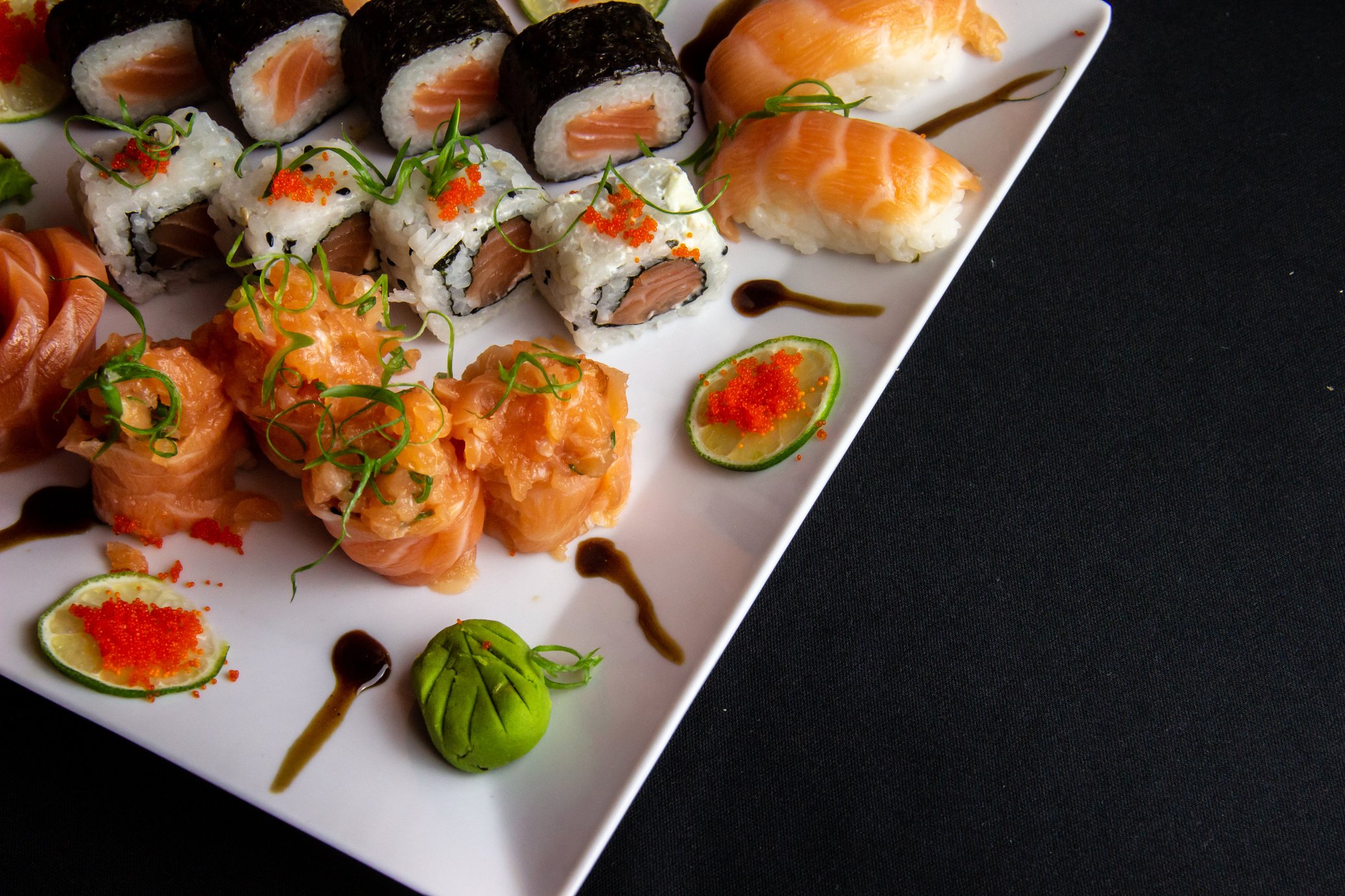 White Ceramic Plate Filled With Sushi